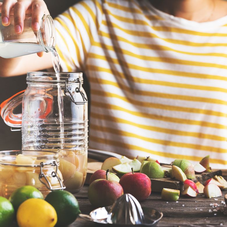 woman making apple cider