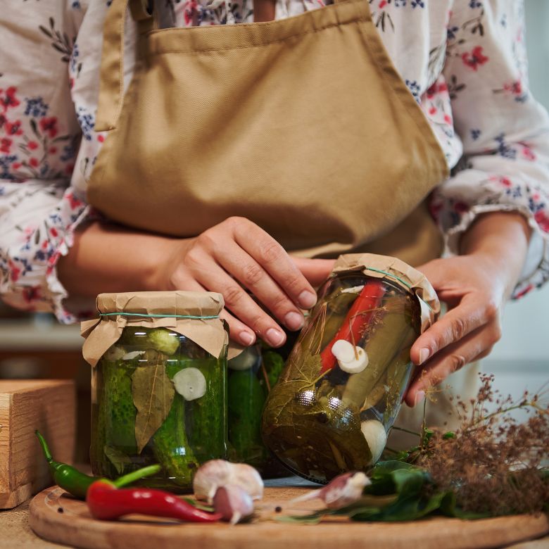 woman pickling vegetables