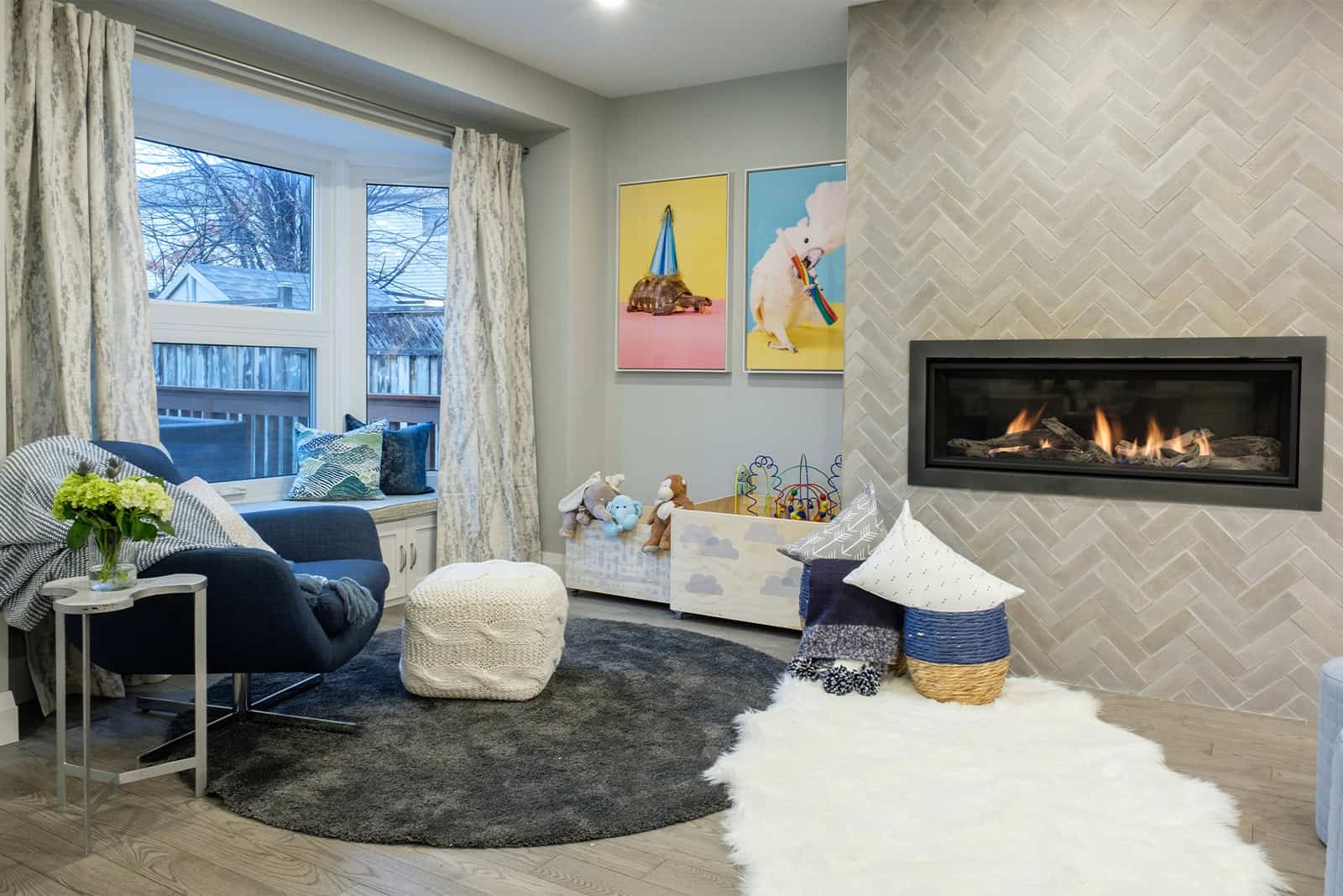 cozy kids' playroom ideas with fireplace and bay window