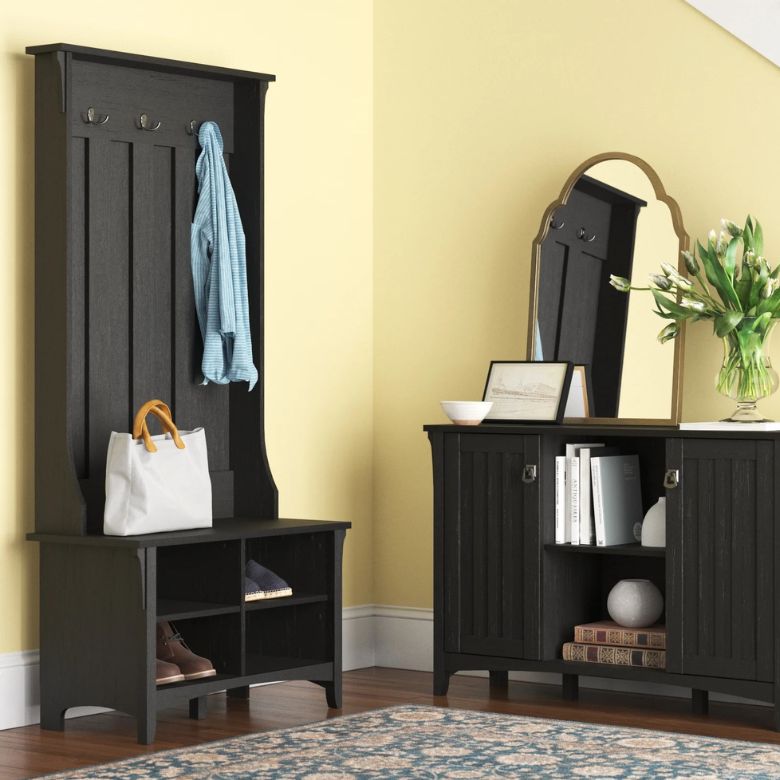 black wooden hall tree with storage bench