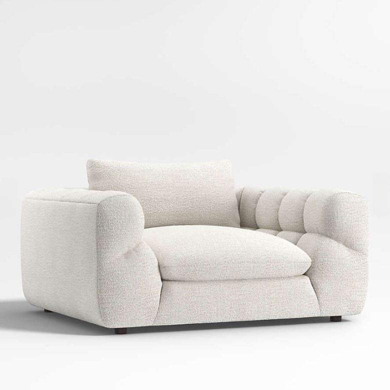 white boucle chair and a half