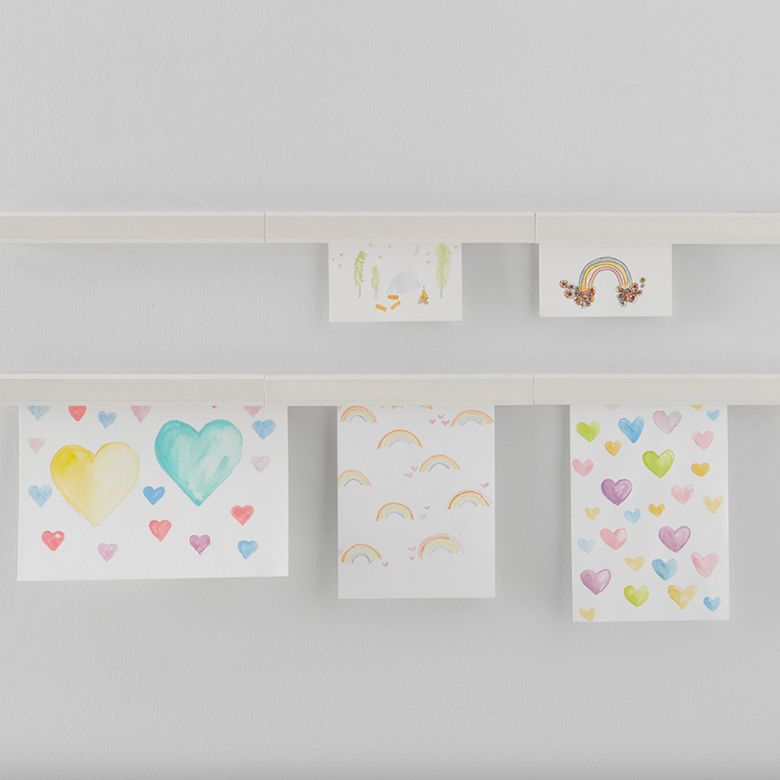 white magnetic art hanger