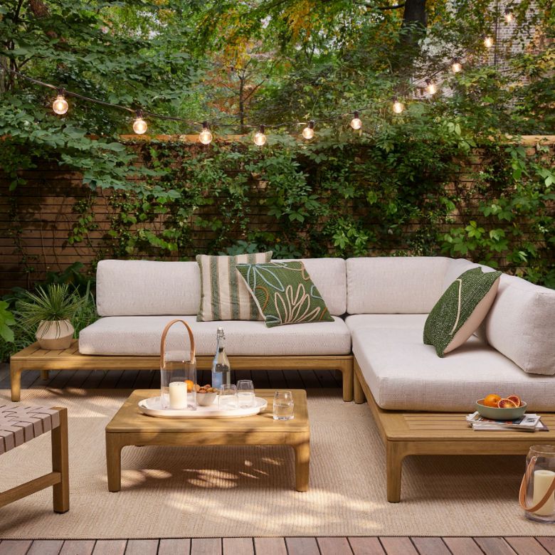 outdoor sectional with beige cushions