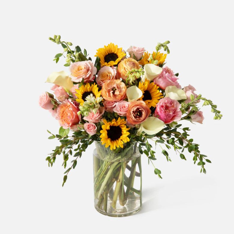 Sunflowers, Roses and Ranunculus Multi-colored flower bouquet.