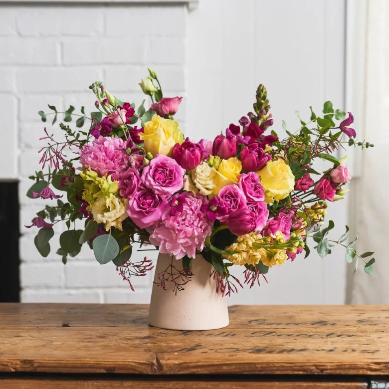 bouquet of roses, peonies, and tulips