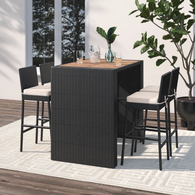 outdoor black rattan bar-height dining table and stools
