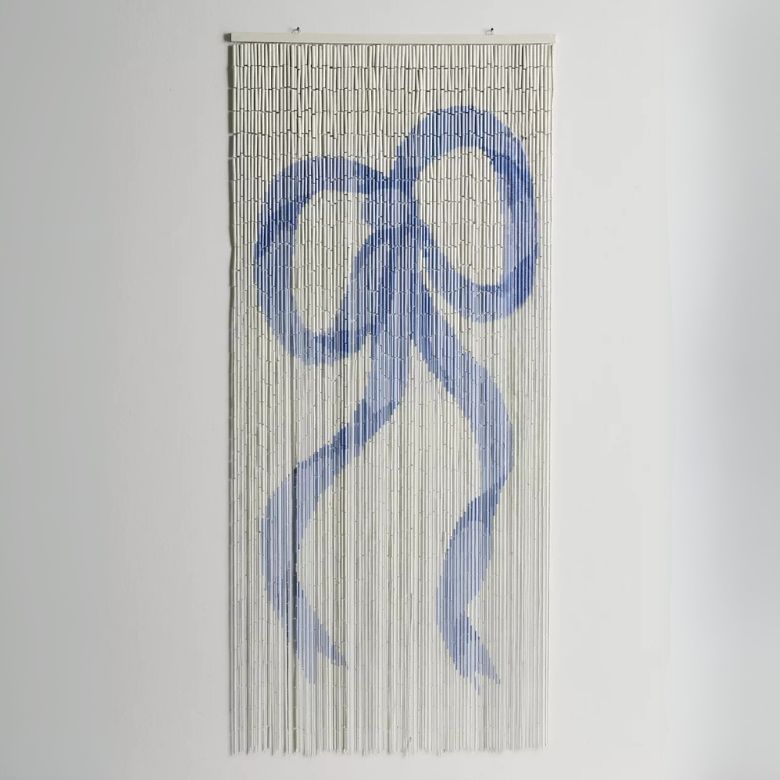 beaded curtain with blue bow