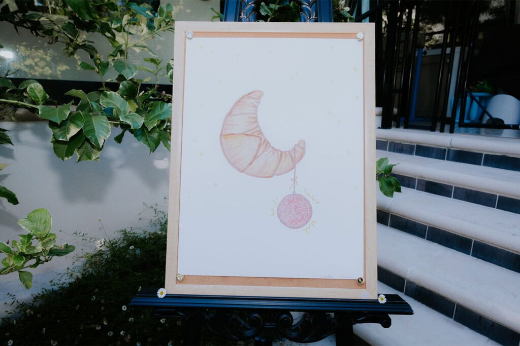 kids birthday party decor ideas with a croissant moon and disco ball