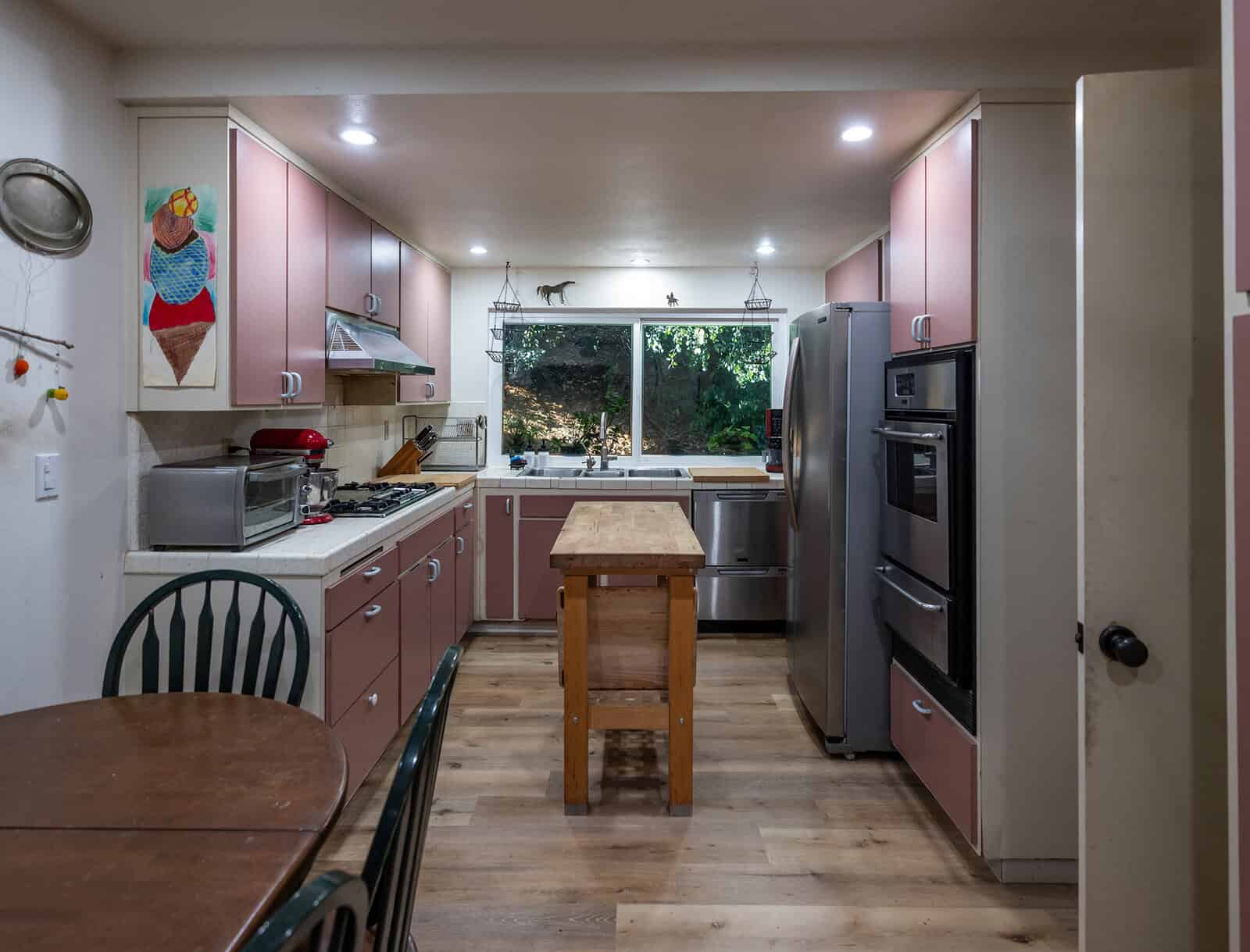 The kitchen prior to renovations with Rachel Brosnahan, as seen on Celebrity IOU.