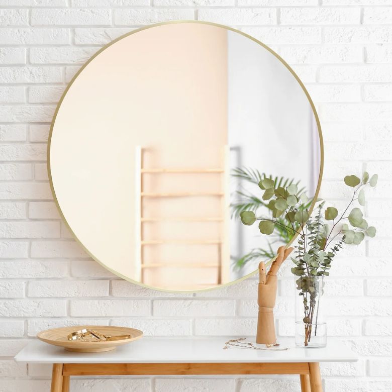 round gold frame wall mirror