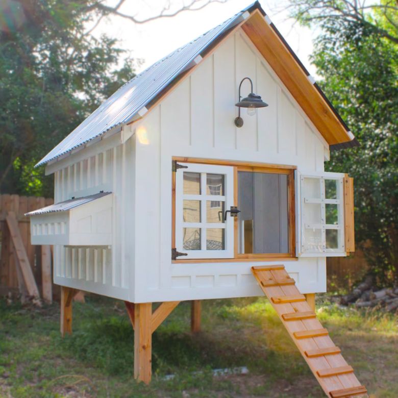 white chicken coop with run