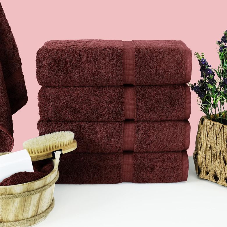 stack of burgundy bath towels