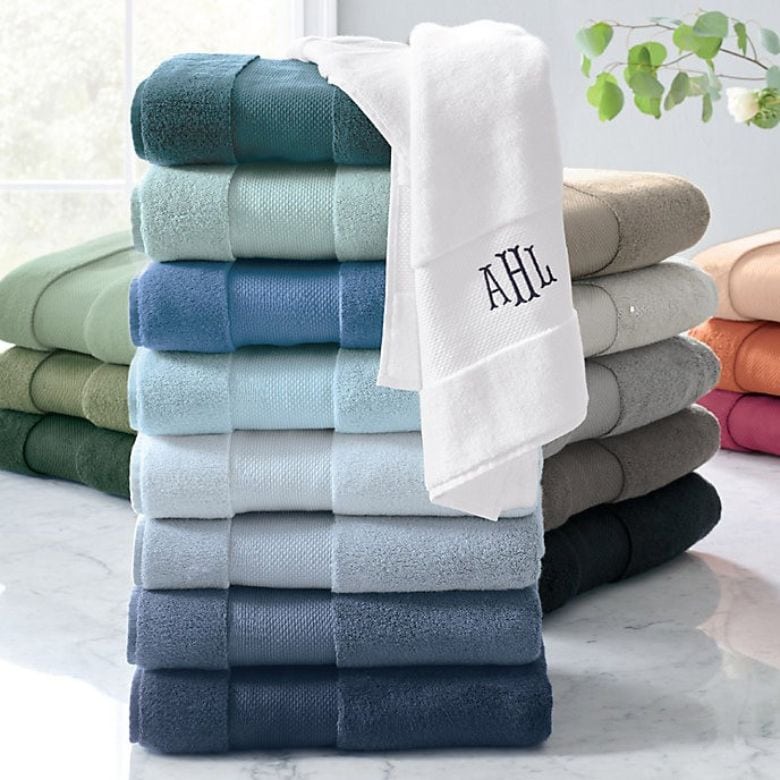 stack of bath towels in different shades of blue