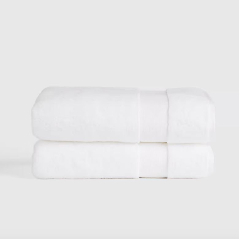 stack of white bath towels