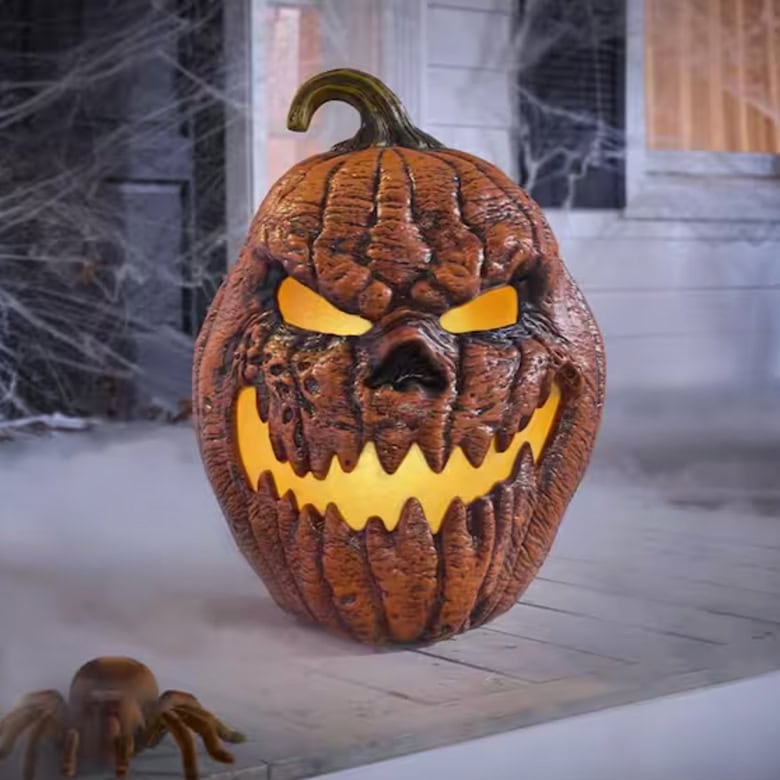 scary grimacing jack-o'-lantern with LED lights