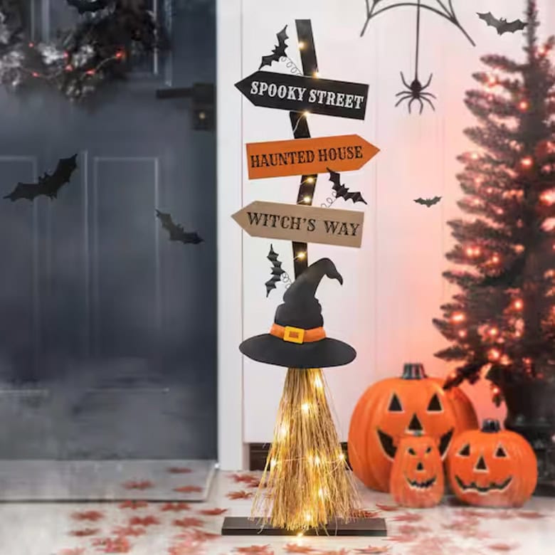 cute halloween broomstick decoration with directions for "spooky street" "haunted house" "witch's way"