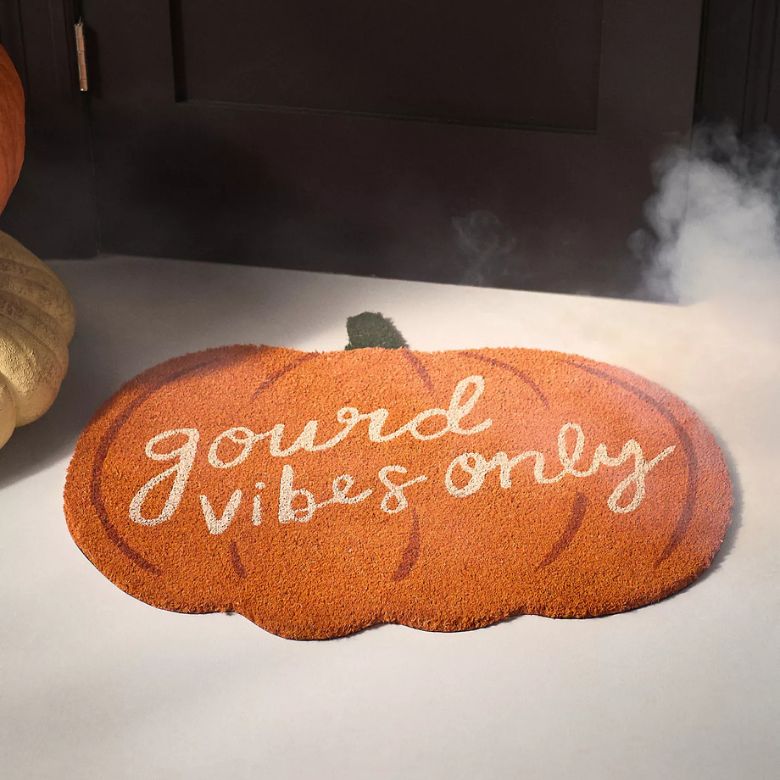 pumpkin-shaped doormat that says "gourd vibes only"