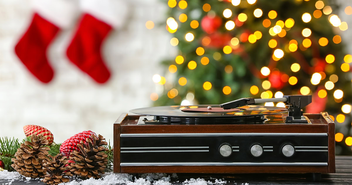 festive turntable playing christmas music playlists