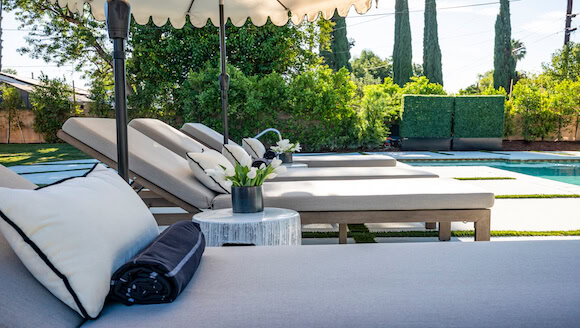 Lounge chairs around pool