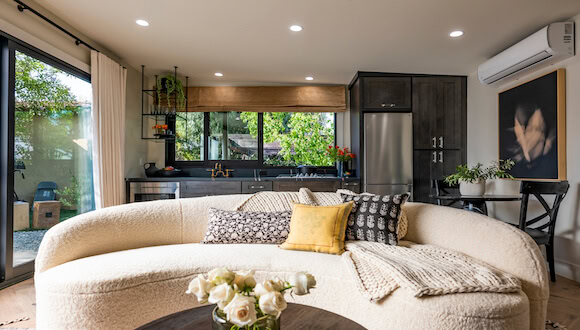 White couch in renovated space