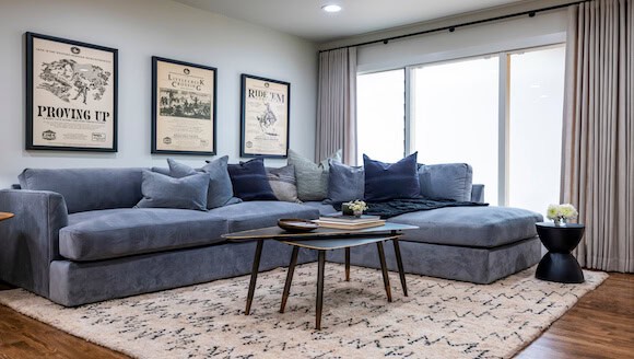 Blue sectional sofa in living room area