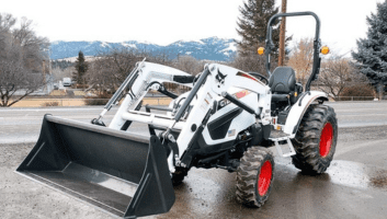Heavy-duty skid steer loader for construction and towing services.