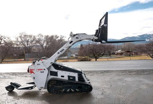 Autonomous tow robot used for equipment transportation and rental services.