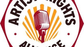 Vibrant logo of Artist Rights Alliance featuring a vintage microphone surrounded by orange rays, emphasizing advocacy for musicians' rights and fair compensation in the music industry.