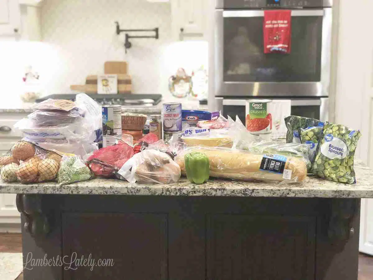ingredients for a freezer meal session on a kitchen island.