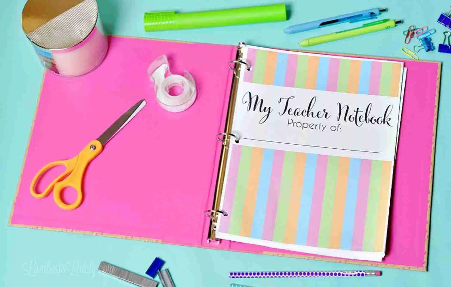 my teacher notebook cover sheet in a notebook on a blue desk.