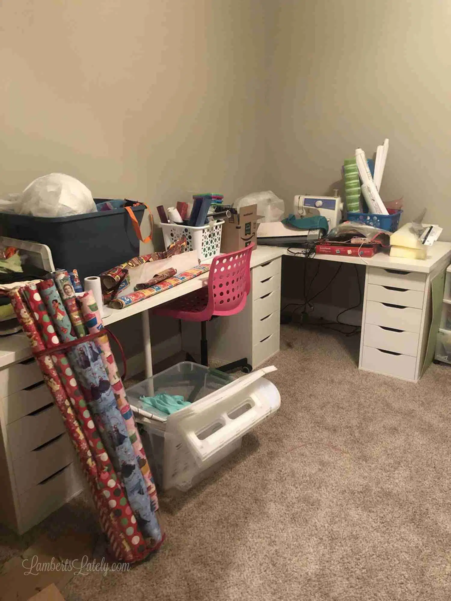 unorganized craft supplies covering a desk.