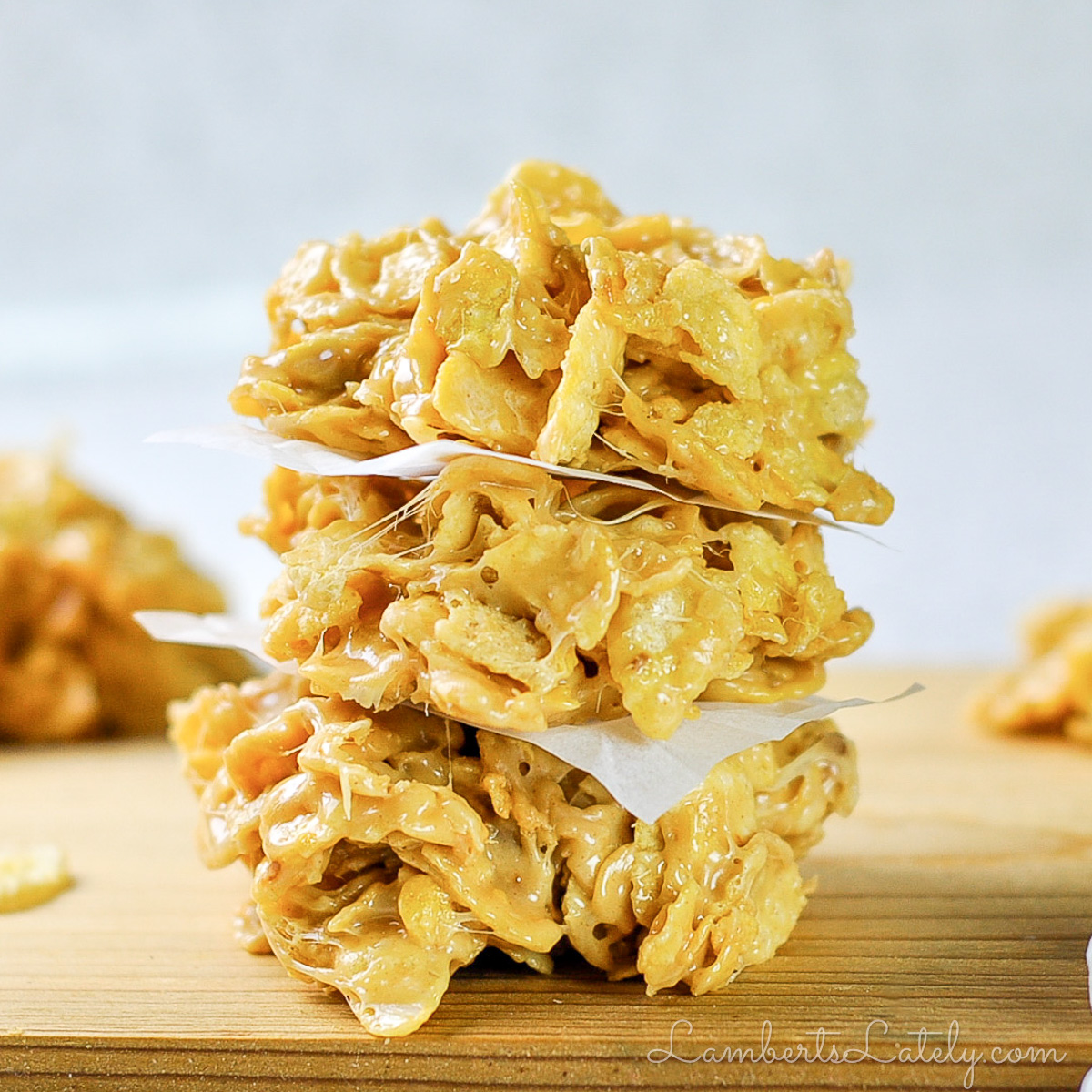 stack of no bake cookies on a cutting board.