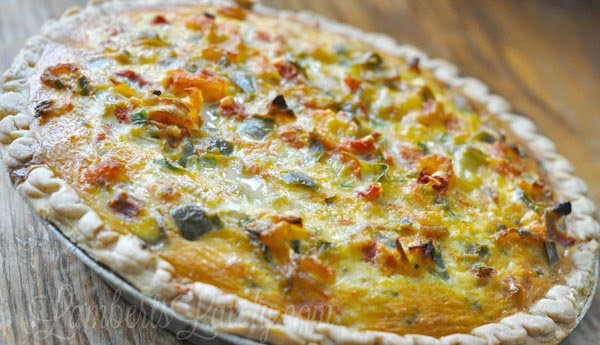 cajun crawfish quiche in a pie dish.