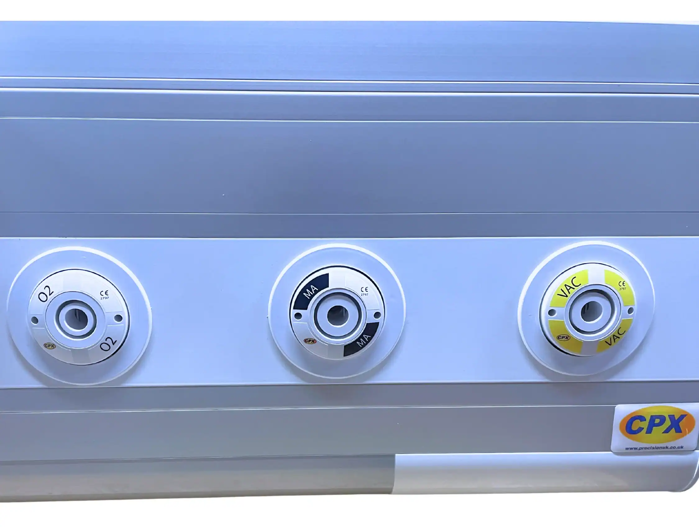 A close up of CPX medical gas outlets on CPX Bedhead Unit upon a white background