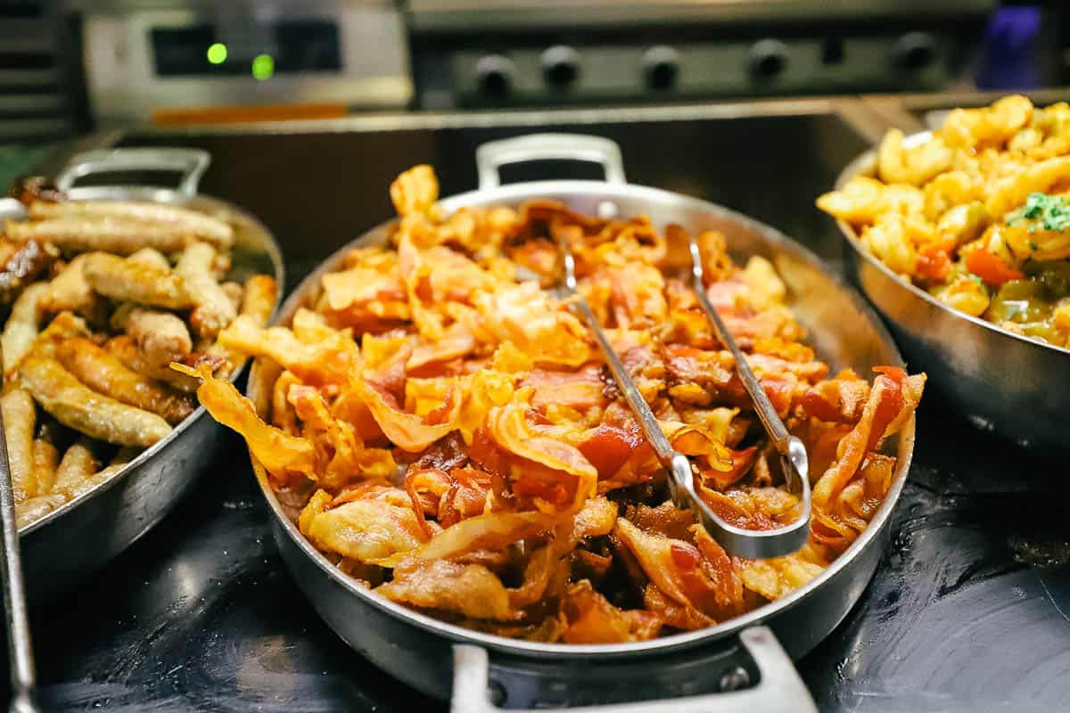 a vat of bacon on the Crystal Palace breakfast buffet