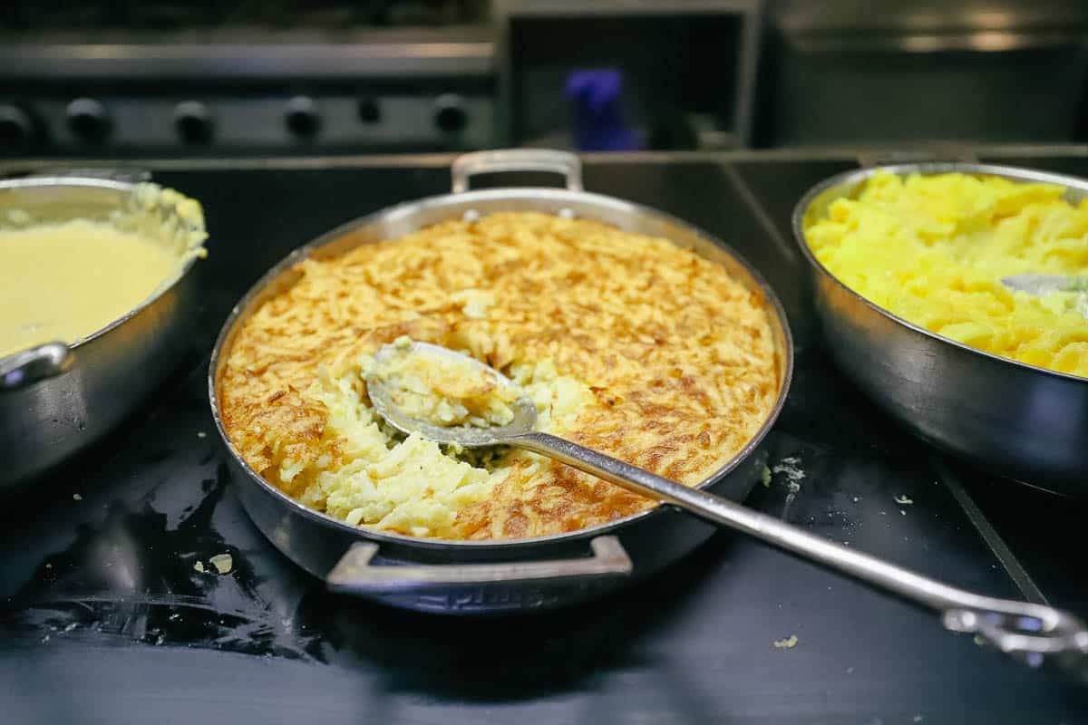 a dish of cheesy potato casserole