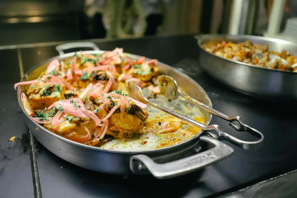 a tofu curry dish on the buffet