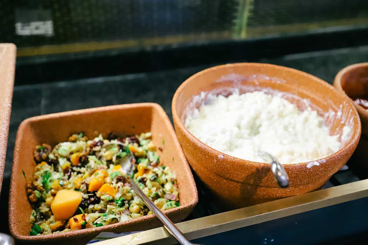an Autumn Harvest grain salad on the buffet next to cottage cheese at Crystal Palace