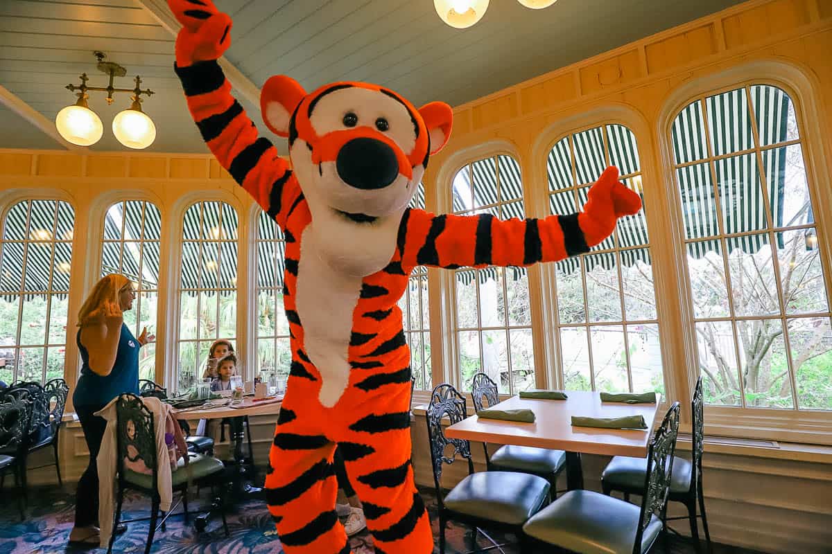 Tigger bounces at the Crystal Palace buffet at Magic Kingdom.