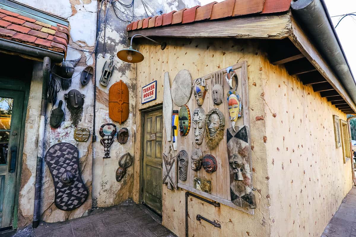 an exterior wall outside Tusker House with masks 
