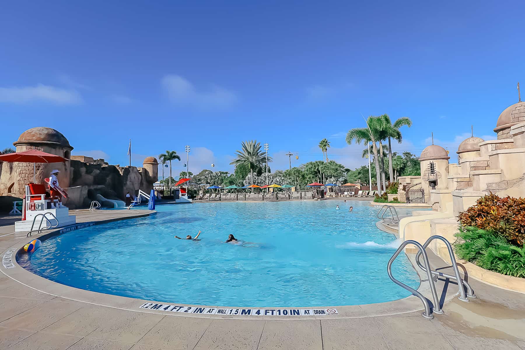 a picture that shows an overall view of the pool at Caribbean Beach
