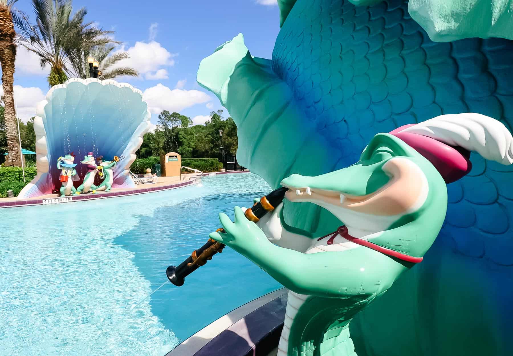 alligators playing a clarinet water feature at Disney's French Quarter