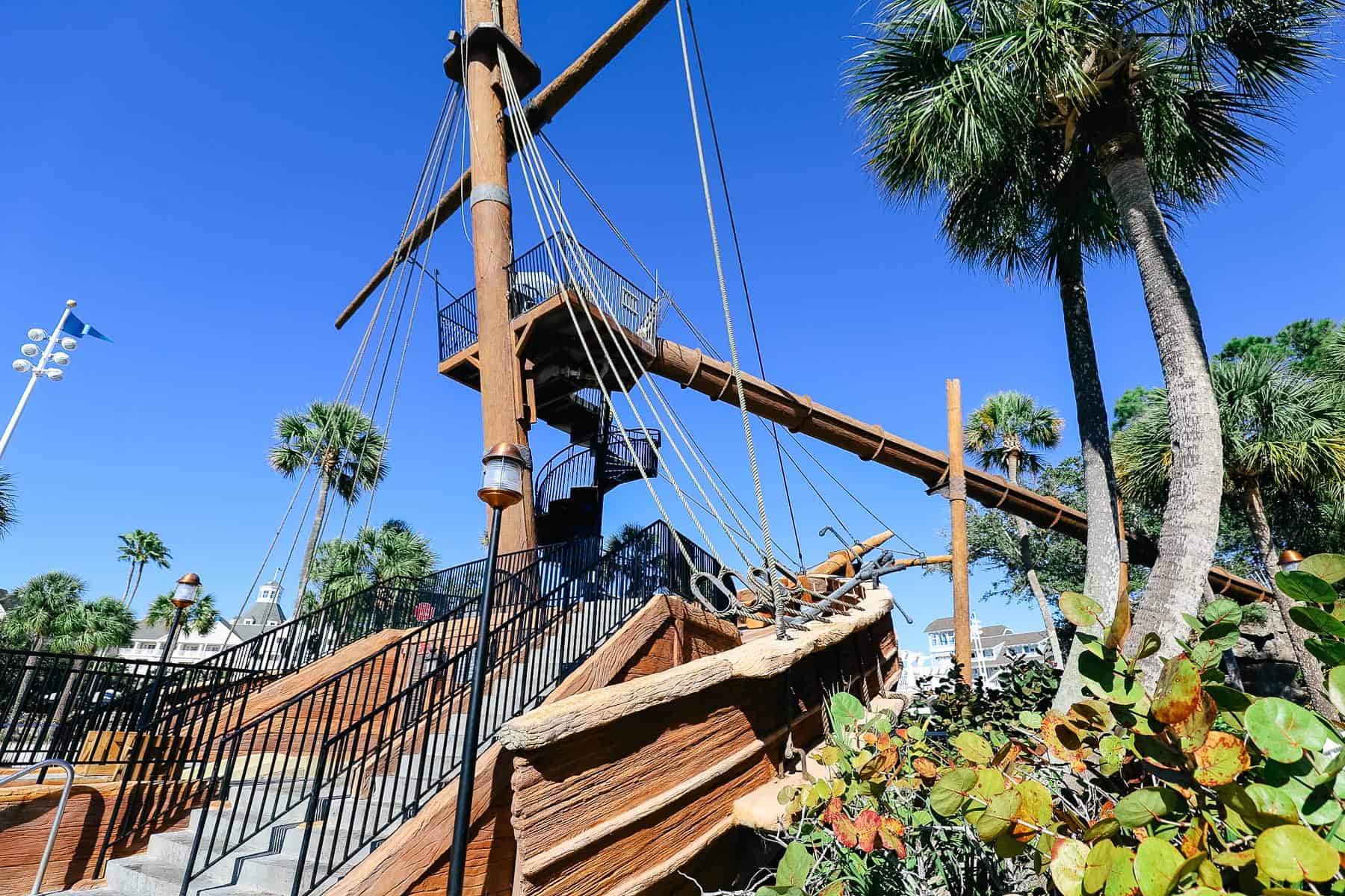 Shows the tube slide extending from the ship's mast.