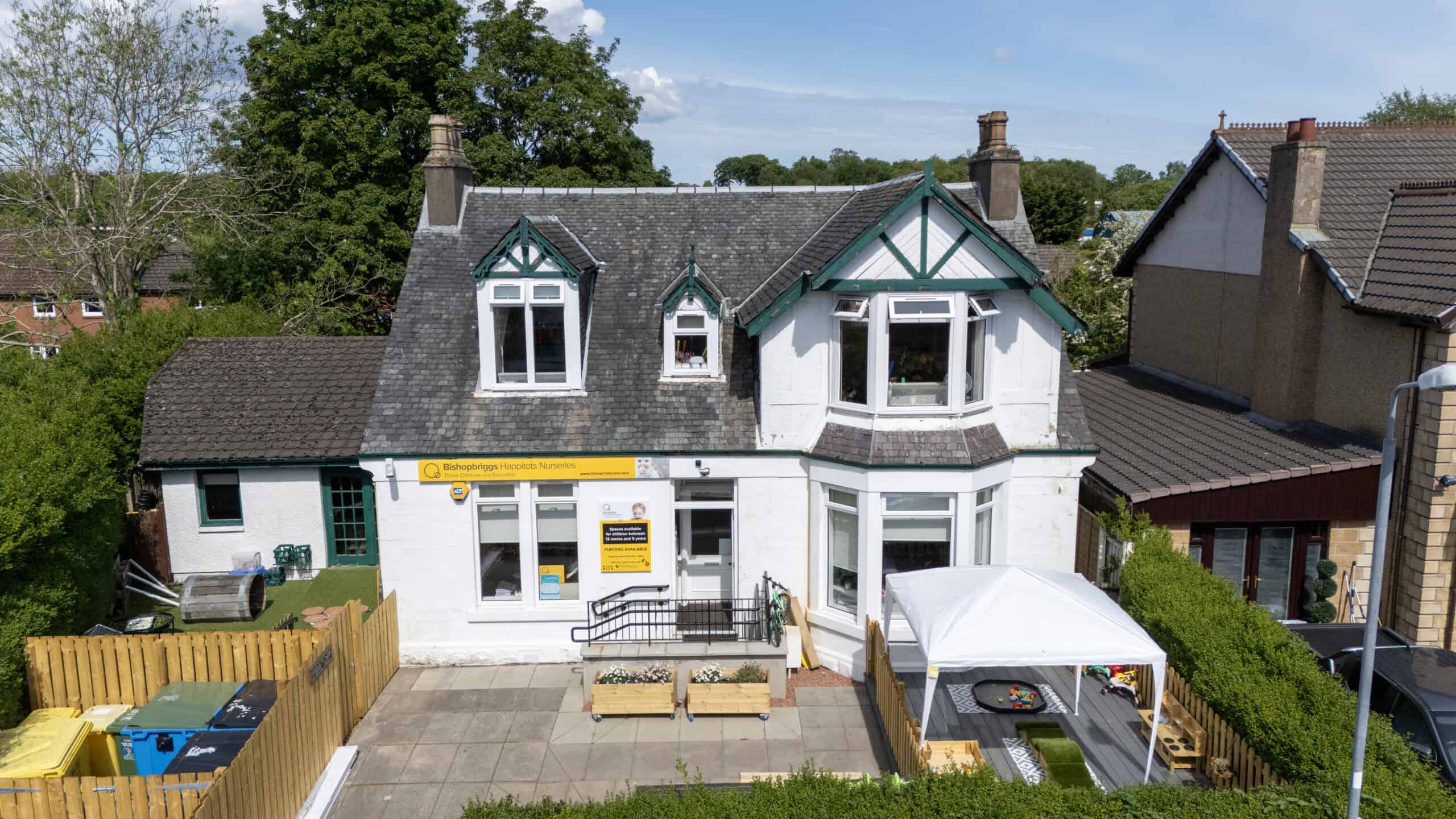 Bright childcare facility with play area, outdoor activities, and nursery rooms at Thrive Childcare centre in Bishopbriggs. Safe, engaging environment for children's early education and development.