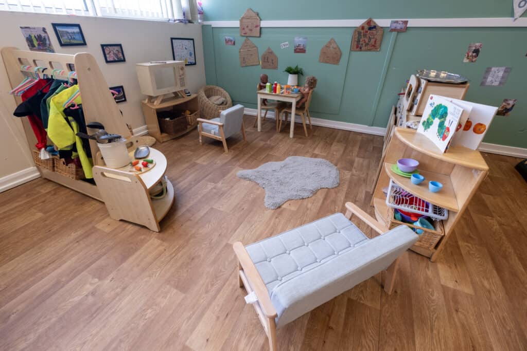 Bright and welcoming toddler playroom at Thrive Childcare featuring educational toys, cosy seating, and creative activities to support early childhood development and learning.