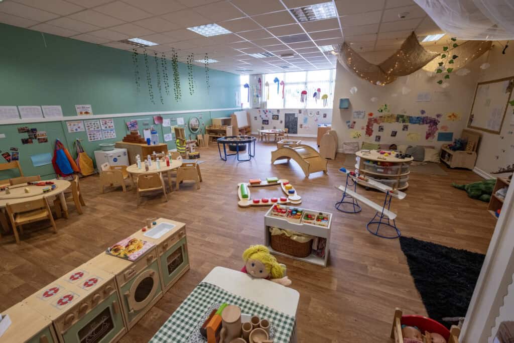 Bright and welcoming childcare environment at Thrive Childcare, featuring colourful play areas, educational toys, and safe spaces designed for children's early development and learning.