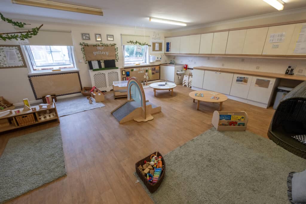 Bright and welcoming early childhood learning environment at Thrive Childcare, featuring colourful play areas, educational toys, and spacious design to support toddler development and engagement.
