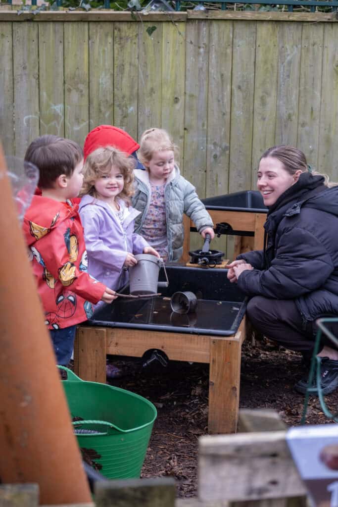 Children engaging in outdoor water play at Thrive Childcare, fostering early childhood development, environmental awareness, and social skills in a safe, nurturing environment.