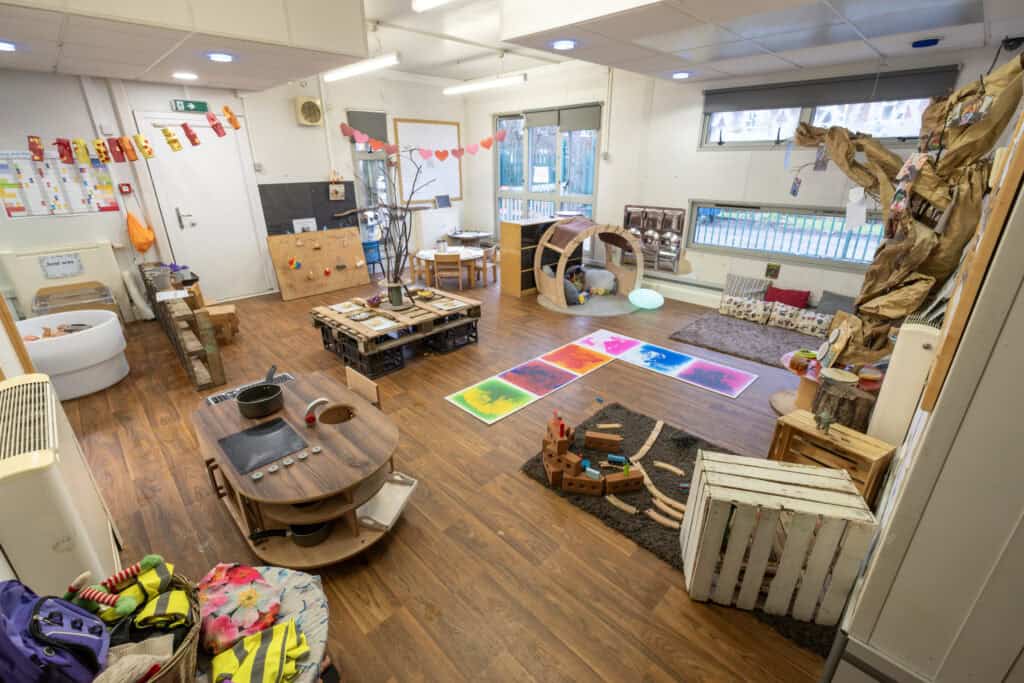 Bright and welcoming early childhood learning environment at Thrive Childcare with creative play areas and sensory activities for children.