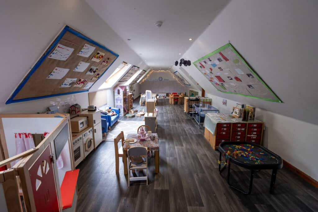 1. Bright and welcoming indoor childcare environment at Thrive Childcare with engaging activities for early childhood development and safe play areas.
